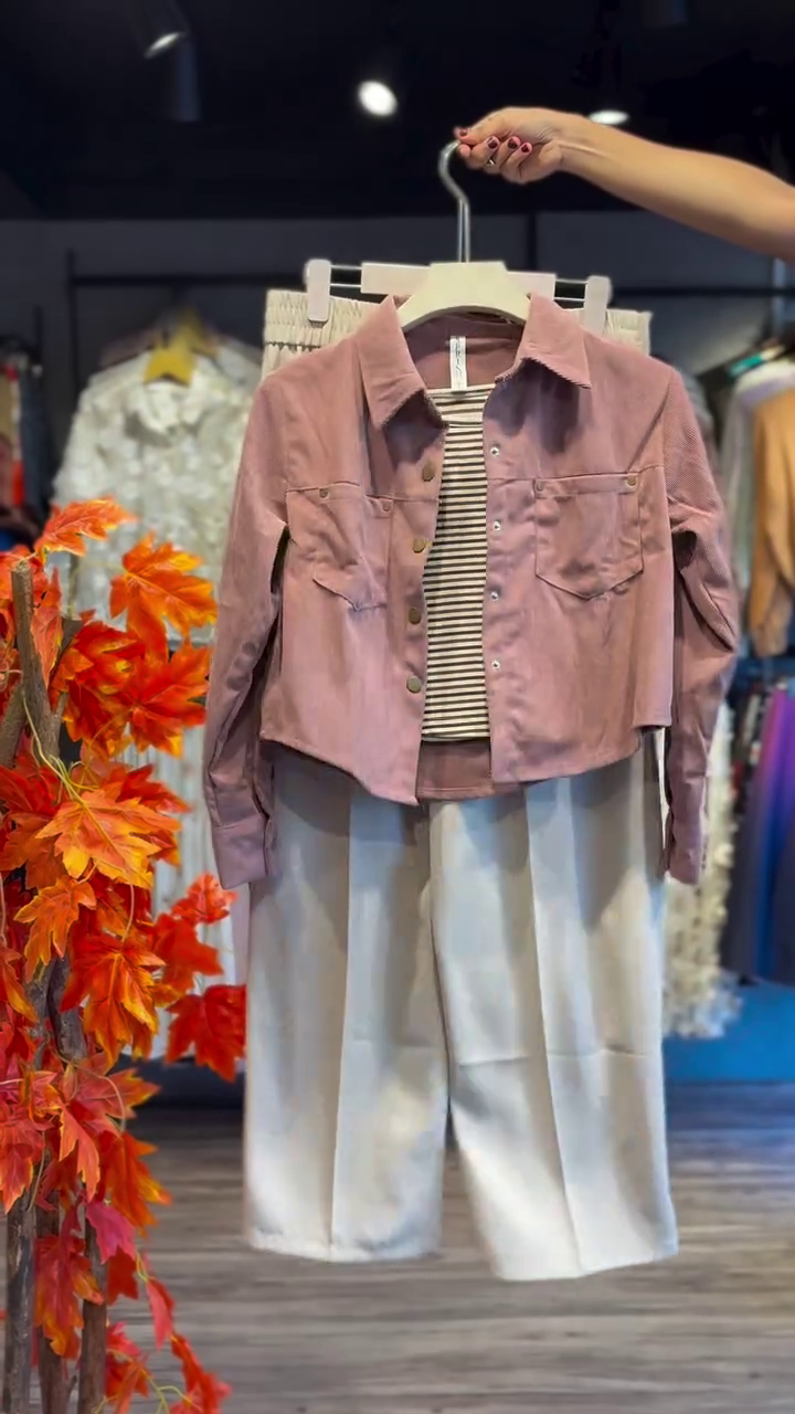 Chic & Contemporary: Pink Cropped Jacket with Light-Colored Trousers