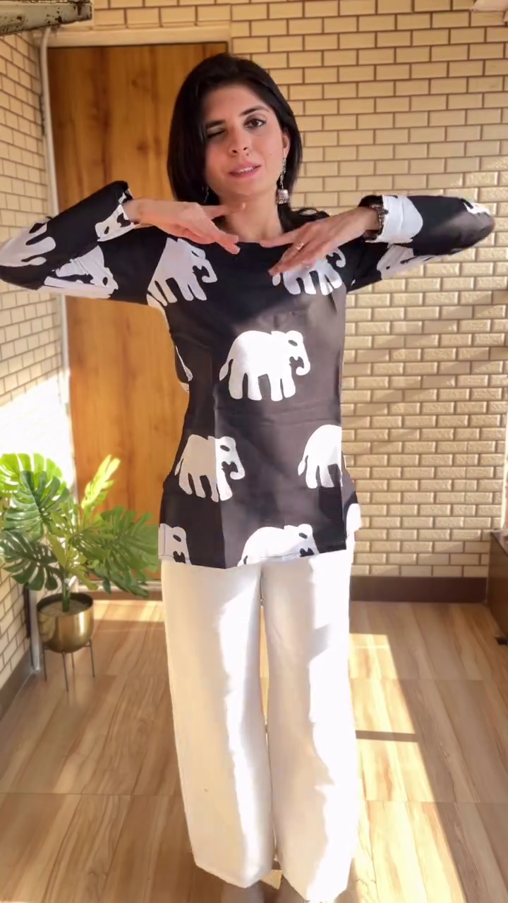 Chic White Embroidered Ethnic Tunic – Vibrant Elephant Motif Kurti for Casual & Fusion Wear 🐘✨