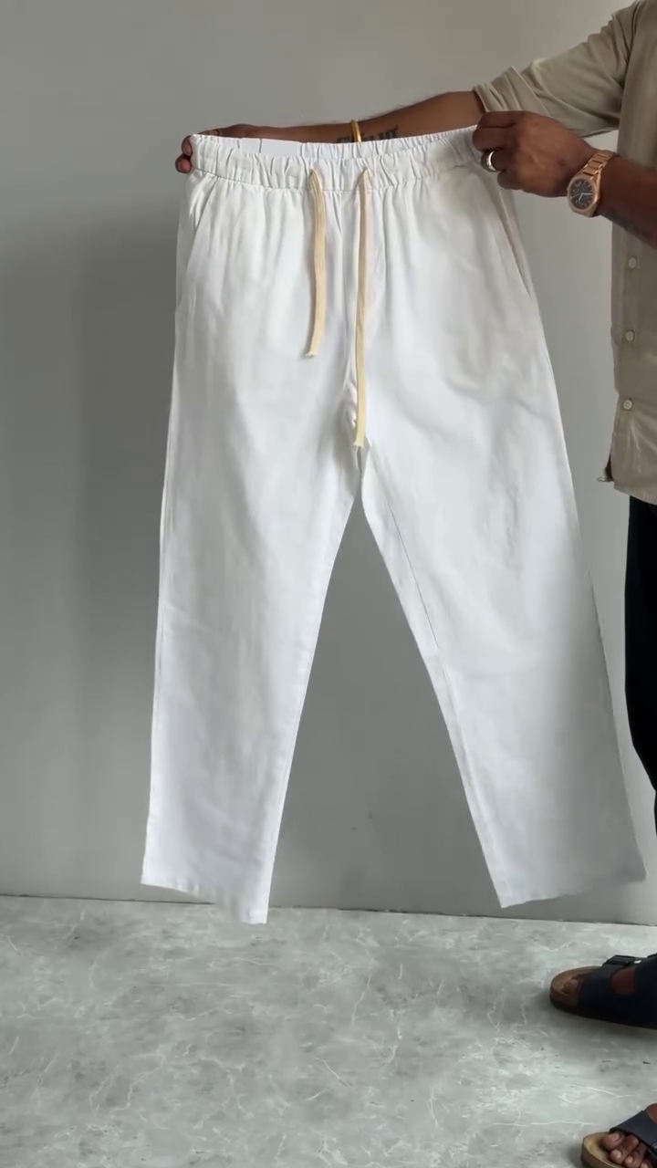Effortless Elegance: Men’s Cream Loose Fit Solid Linen Blend Trousers for All-Day Comfort