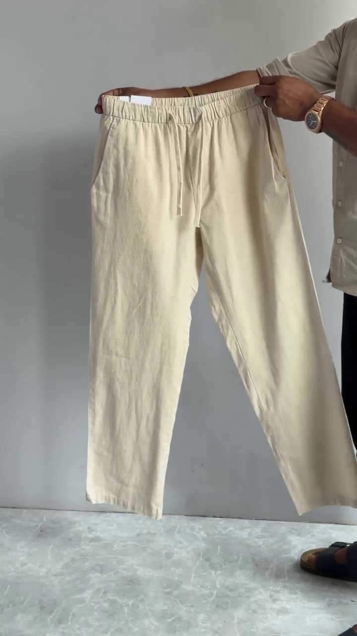 Effortless Elegance: Men’s Cream Loose Fit Solid Linen Blend Trousers for All-Day Comfort