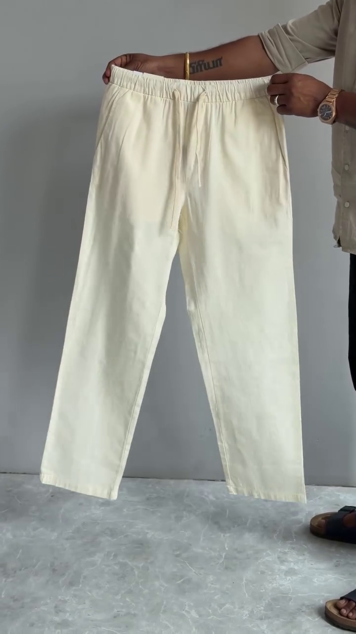 Effortless Elegance: Men’s Cream Loose Fit Solid Linen Blend Trousers for All-Day Comfort